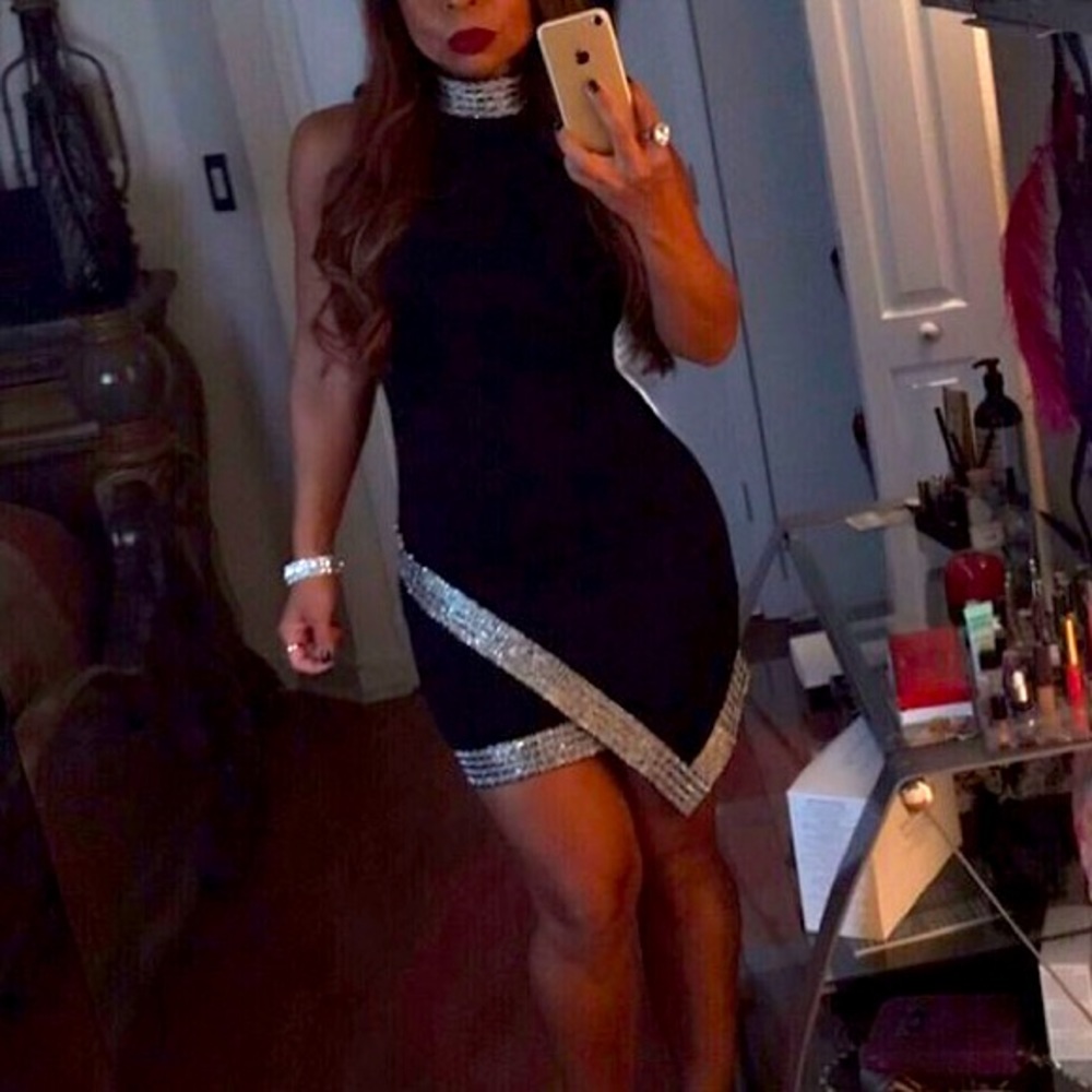 Stunning asymmetrical bebe dress.